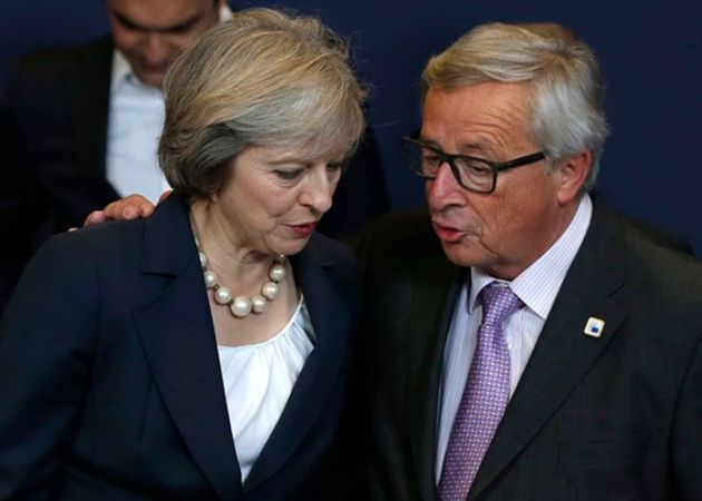 Theresa May y Jean Claude Junker